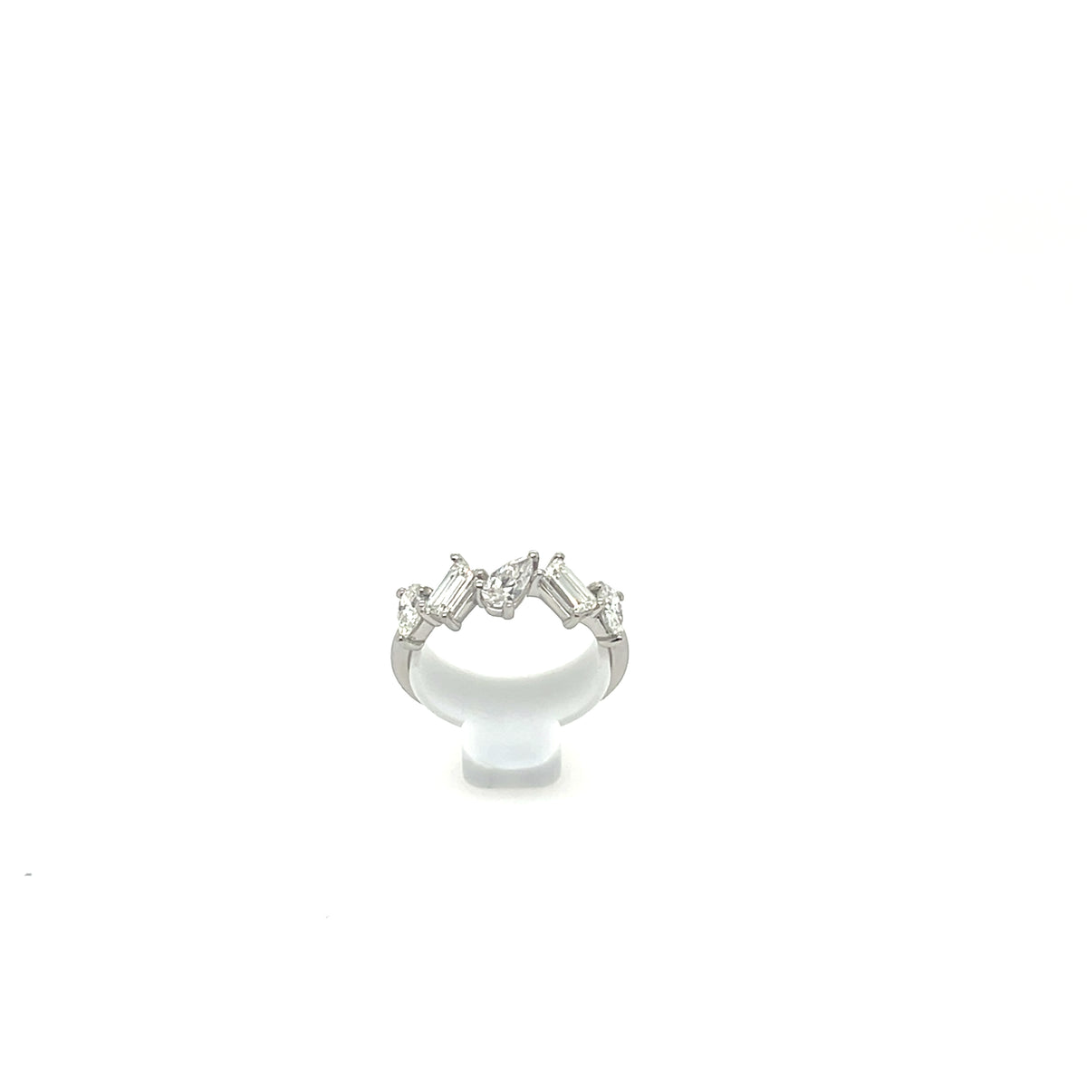 Platinum ring with Pear and Emerald Cut Diamonds