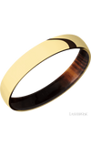 4 mm wide Domed 14K Yellow Gold band featuring a Cocobolo sleeve.