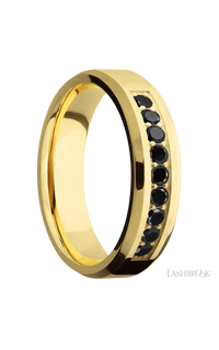 6 mm wide/Beveled/14K Yellow Gold band with an  arrangement of 9, .05 carat Round Black Diamond stones in a Bead Channel setting.