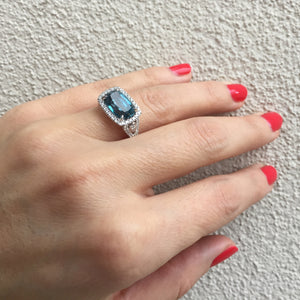 Doves London Blue Cushion Topaz Diamond Halo Rectangular Ring on model