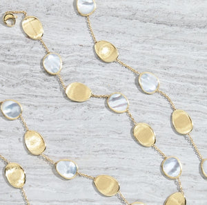 Marco Bicego necklace set in 18k yellow gold with alternating white mother of pearl Lunaria station