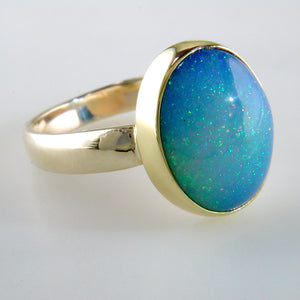 Ethiopian Opal Pinfire Oval Gold Ring