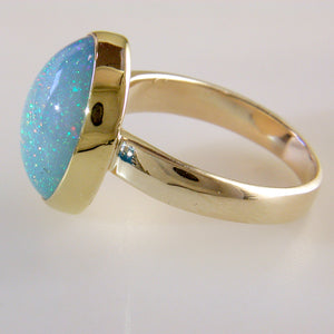 Ethiopian Opal Pinfire Oval Gold Ring