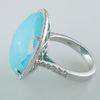 Doves "St. Barths" Blue Turquoise, White Topaz, & Diamond Halo White Gold Blue Oval Ring